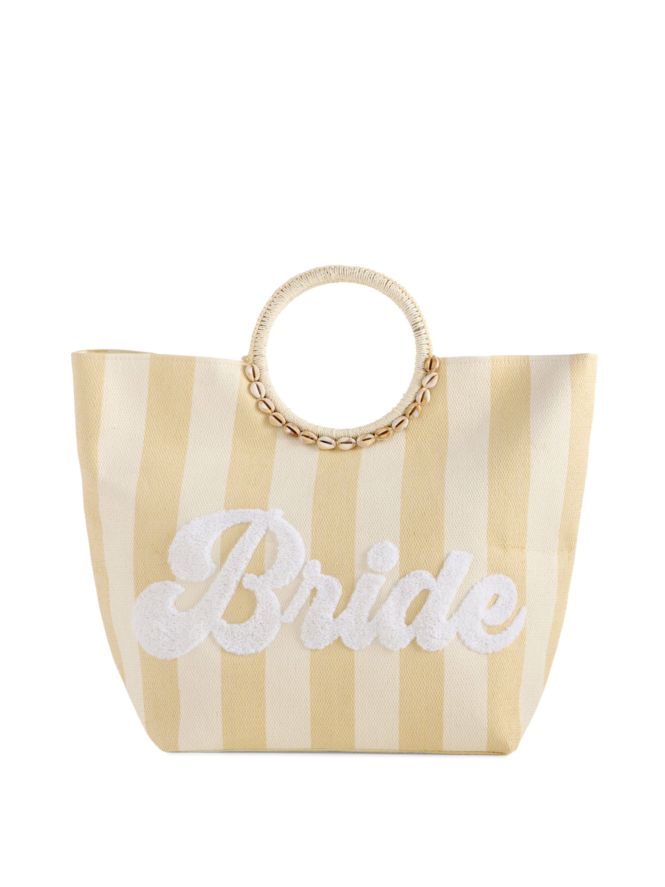 striped tote bag with round woven handles and “Bride” in white script across the front, perfect for weddings or bachelorette trips.