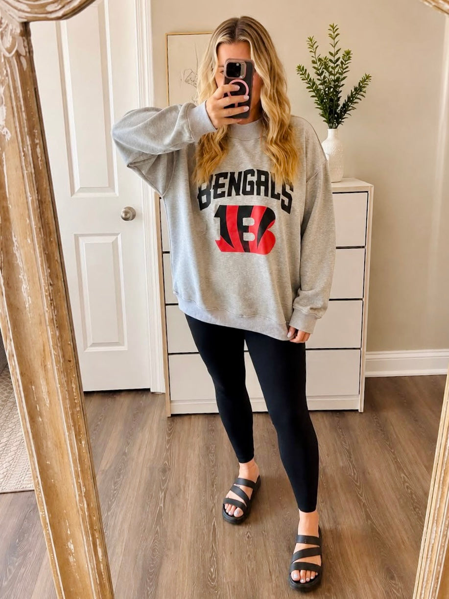 Gray Bengals reversible mock neck sweatshirt with Cincinnati Bengals graphic styled with black leggings