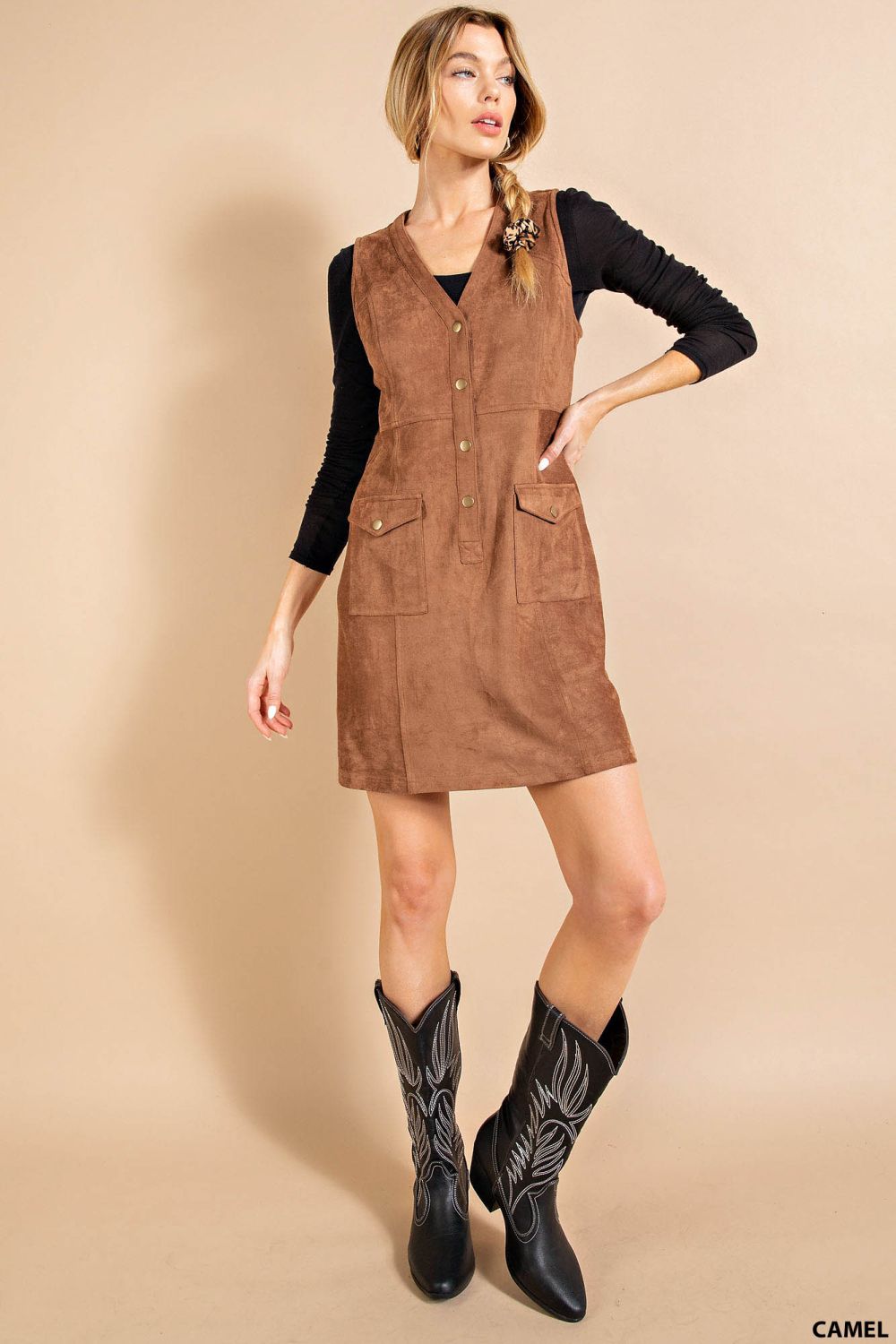 Women’s camel suede mini dress with V\-neck, button front and patch pockets styled with cowboy boots