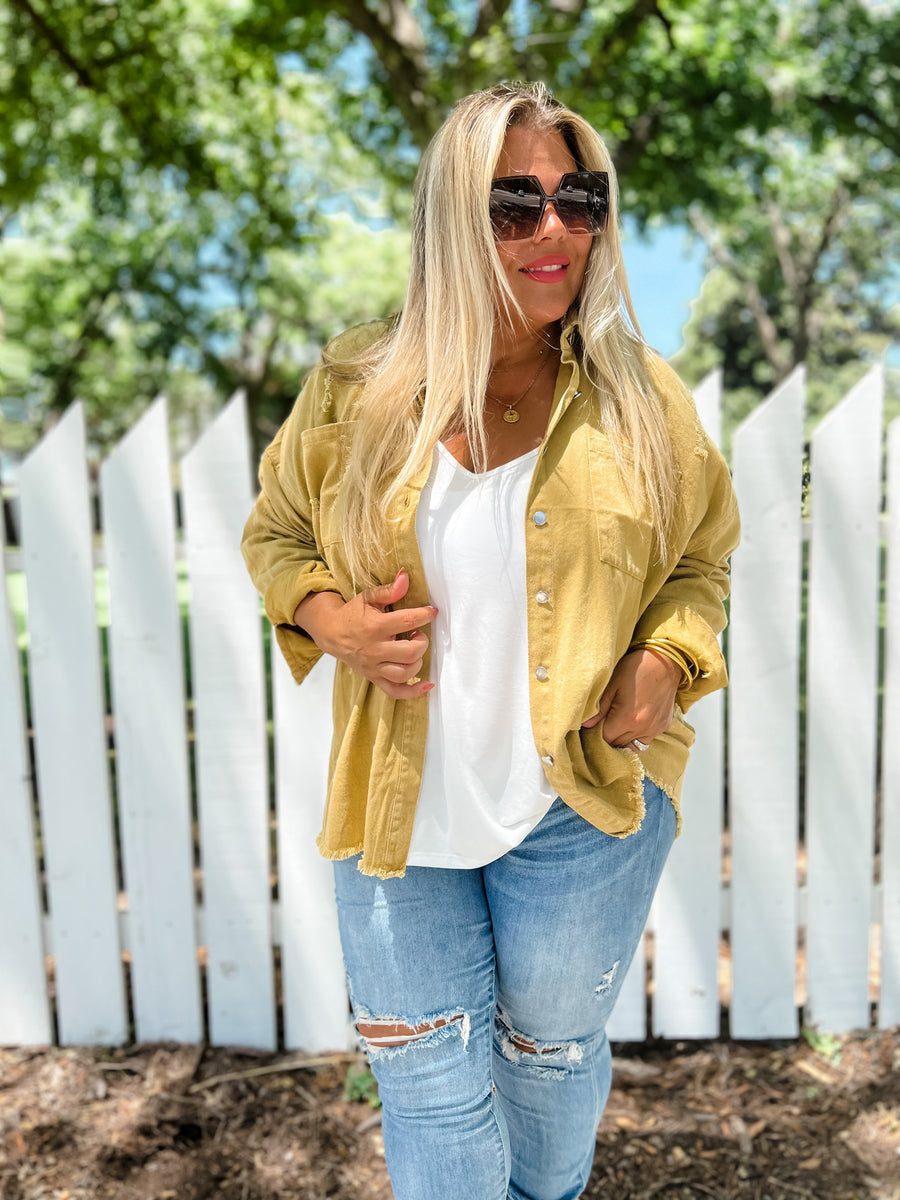 S Women’s oversized distressed denim shacket with button front, chest pockets and raw frayed hem