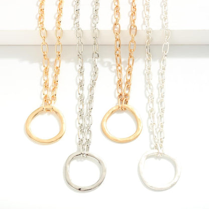 Short Chain Link Necklace Featuring Hammered Pendant