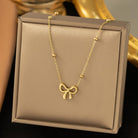 Stainless Steel Saturn Chain Link Necklace With Bow Station-How Cute is That? Boutique