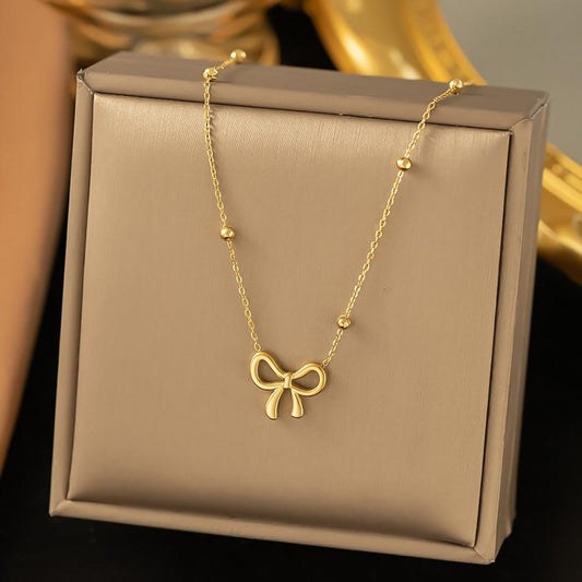 Stainless Steel Saturn Chain Link Necklace With Bow Station