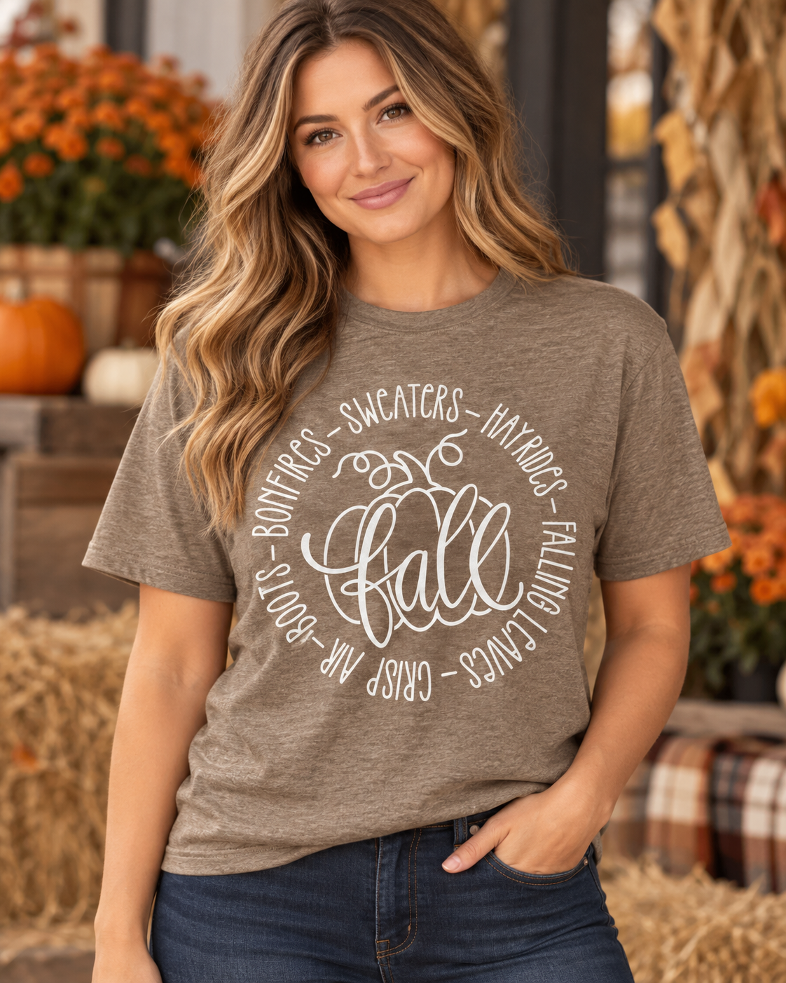 Women’s heather taupe fall graphic T-shirt with pumpkin, bonfires, sweaters, hayrides, falling leaves, crisp air and boots design