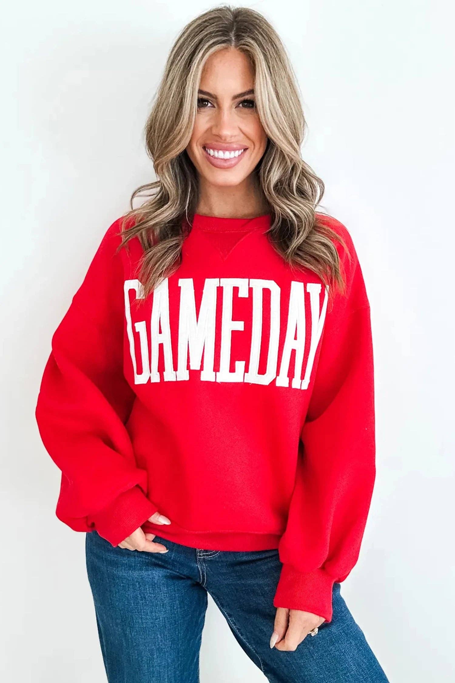 Women’s Game Day letter patch crewneck sweatshirt with oversized collegiate-style lettering and relaxed fit.