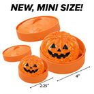 Glow-in-the-dark Halloween pumpkin dumpling squishy toys.