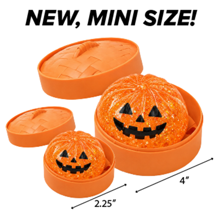 Glow-in-the-dark Halloween pumpkin dumpling squishy toys.
