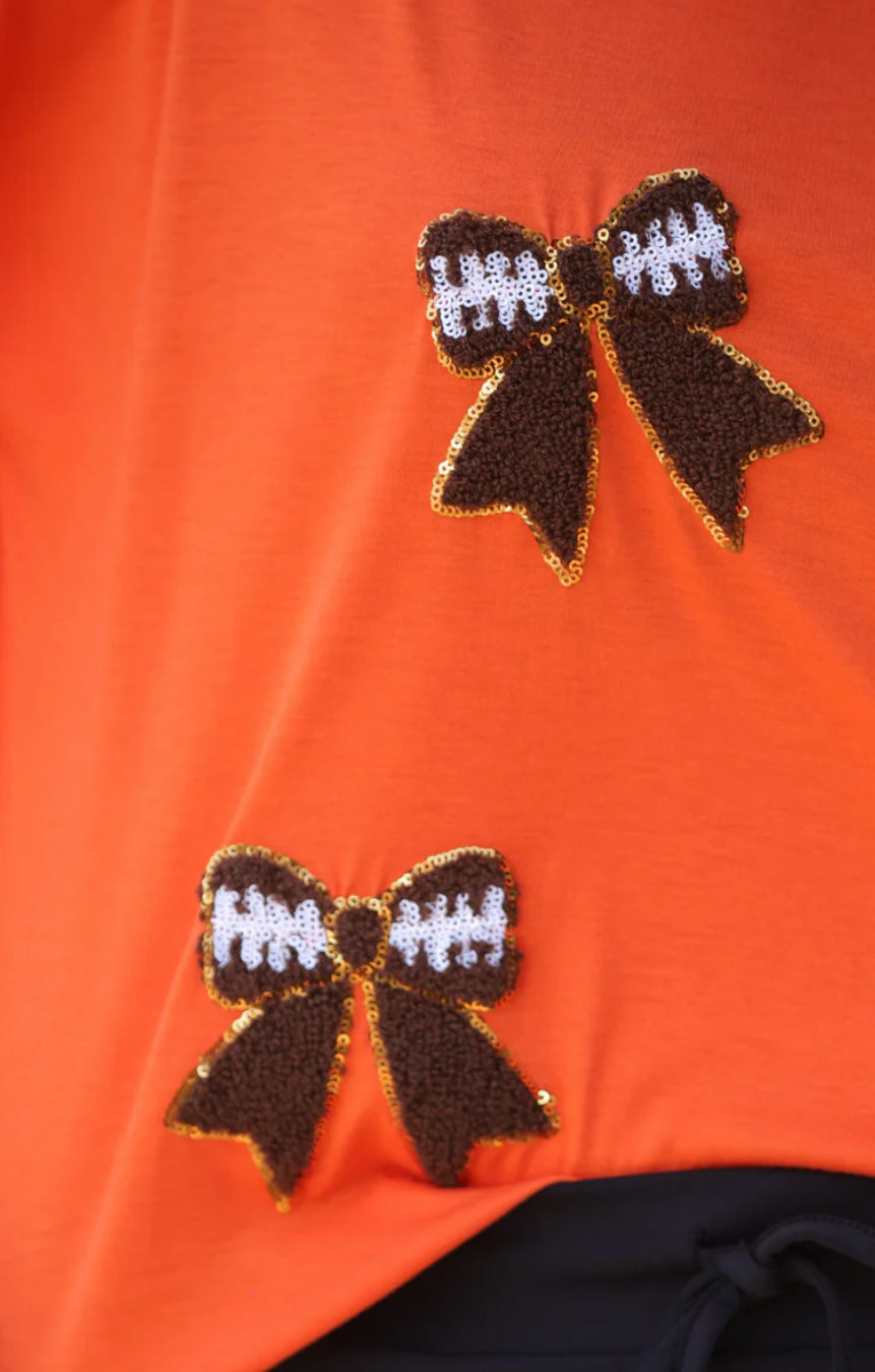 Sideline Sparkle Ruffle Top in Orange