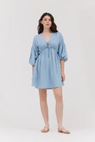 Grade & Gather light blue chambray mini dress with V-neck tie, gathered waist and balloon sleeves
