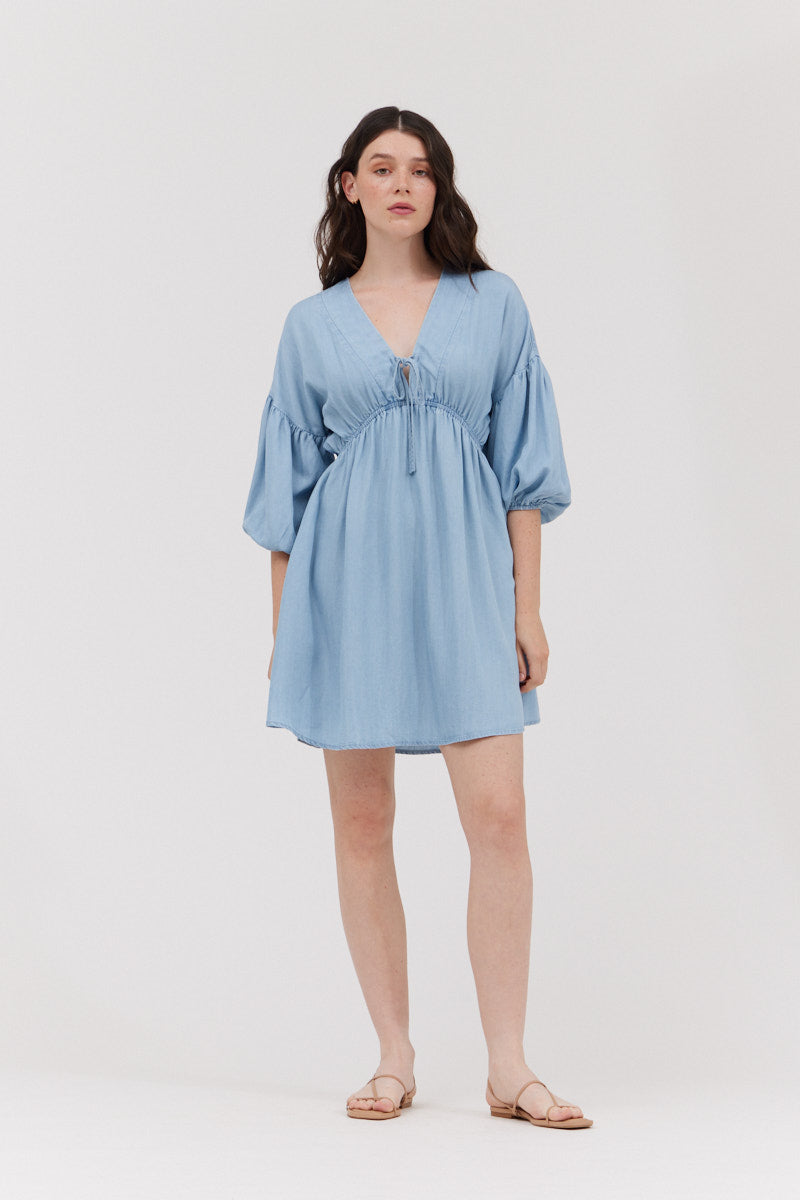 Grade & Gather light blue chambray mini dress with V-neck tie, gathered waist and balloon sleeves