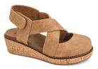 A Corky’s  tan wedge sandal with crisscrossing straps and a cork-textured wedge heel,