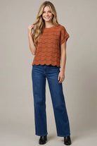 Women’s rust scallop stripe short sleeve knit sweater top styled with jeans