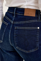 Back view of Judy Blue Twilight Blue wide leg jeans showing rear pockets and finished hems