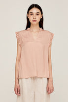Women’s peach ruffle sleeve satin blouse with V-neckline and relaxed fit